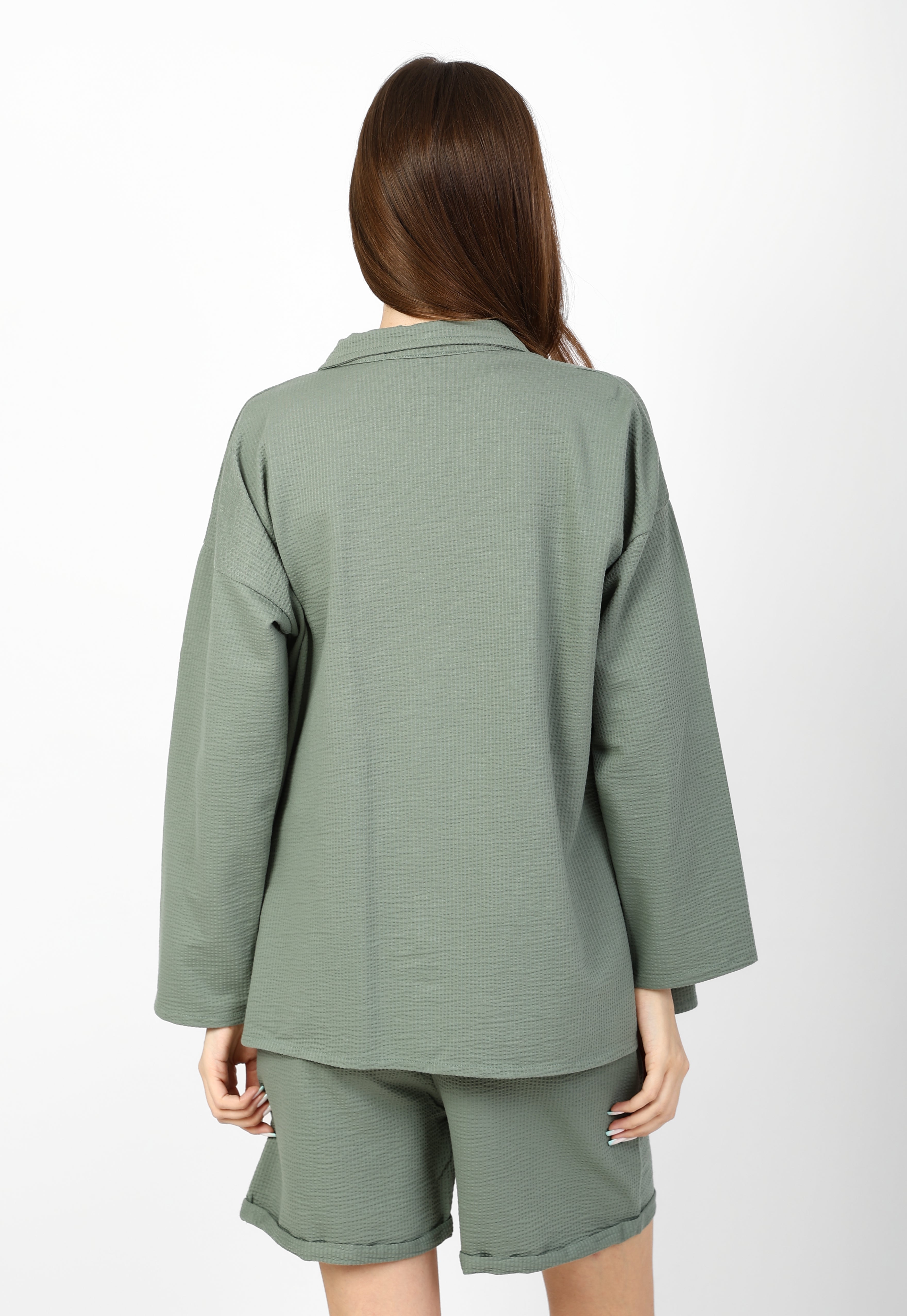 Modern 3-piece summer set (shirt, shorts, and top).