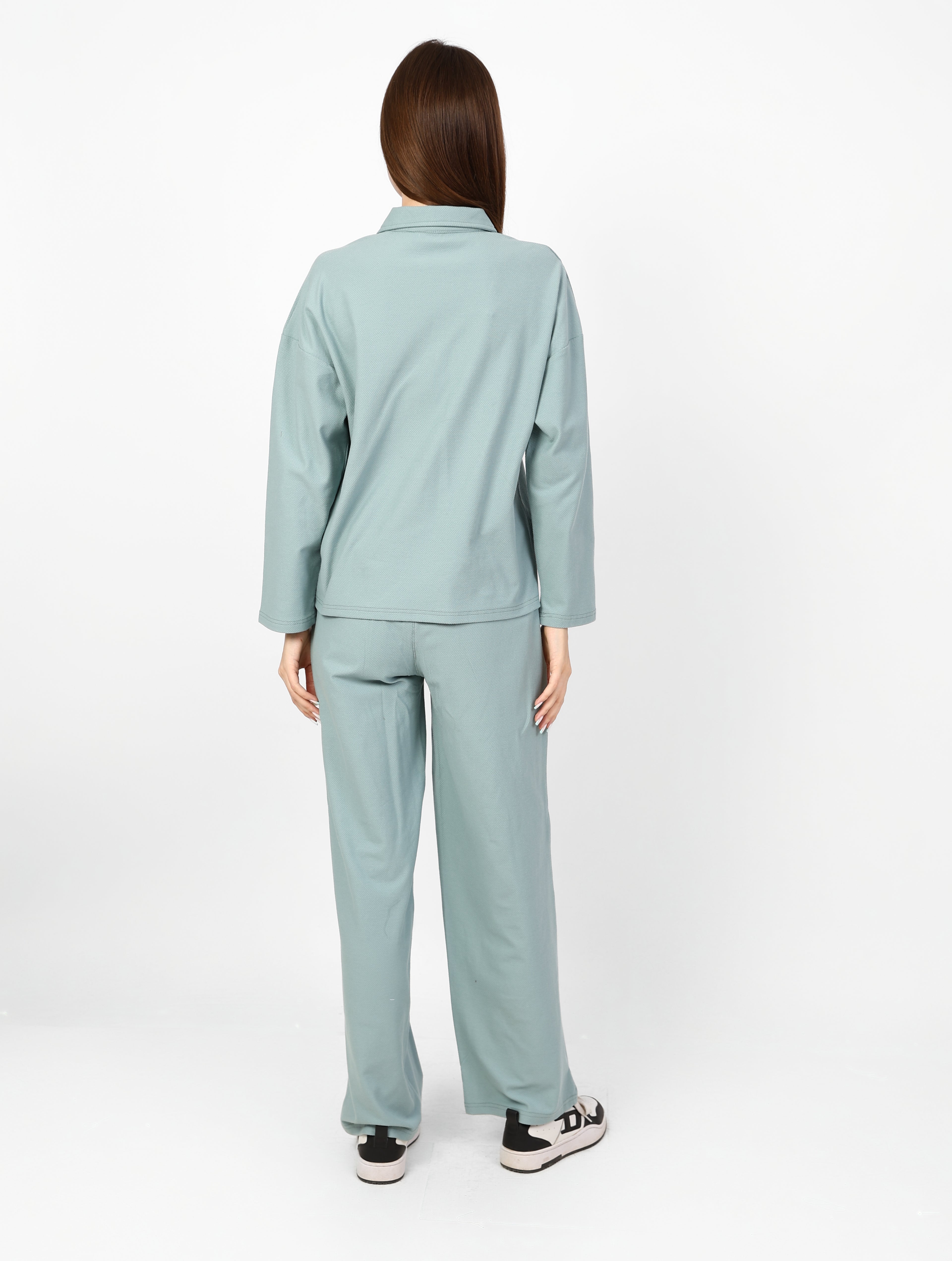 Casual matching set with an oversized top and straight-leg trousers.