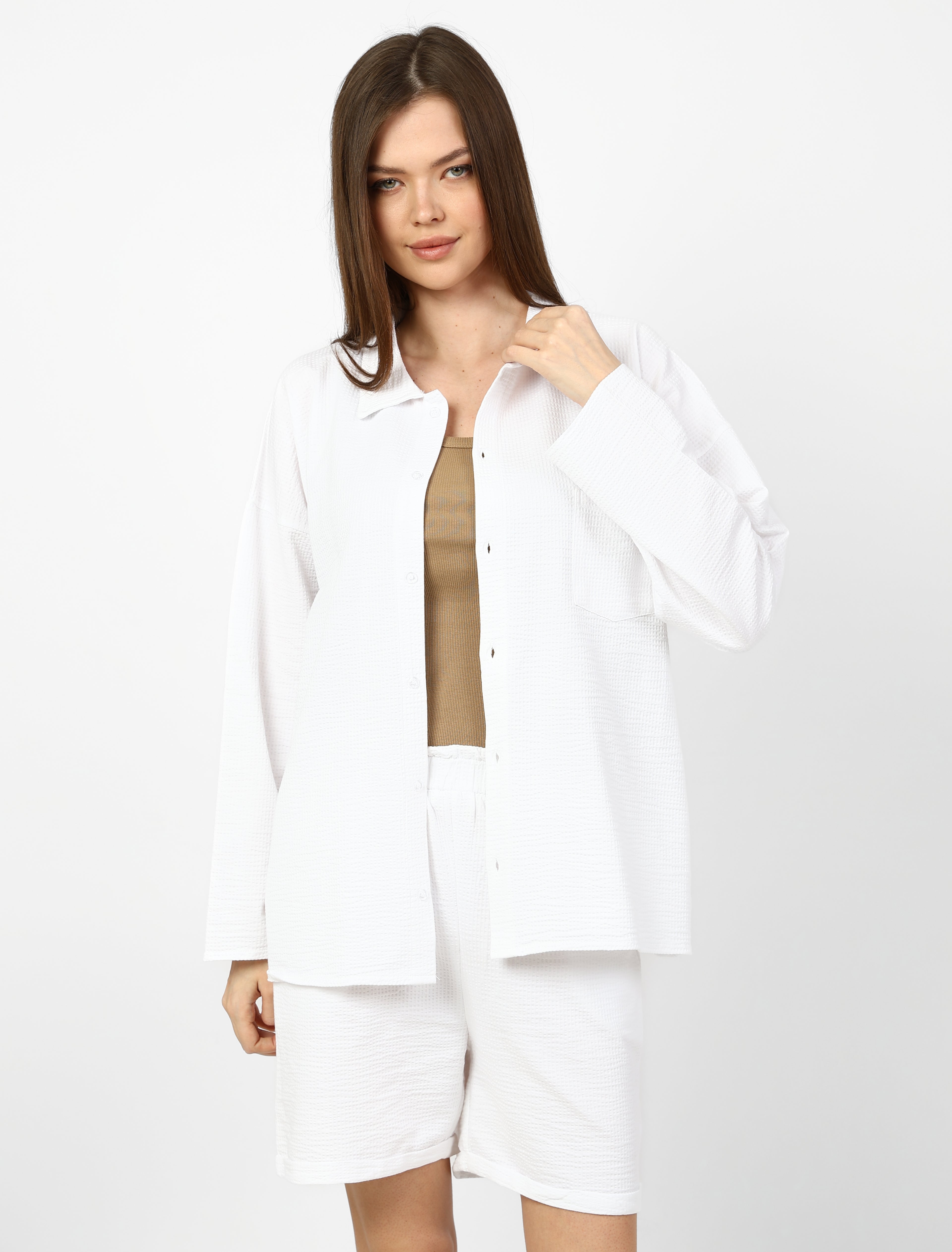 Modern 3-piece summer set (shirt, shorts, and top).