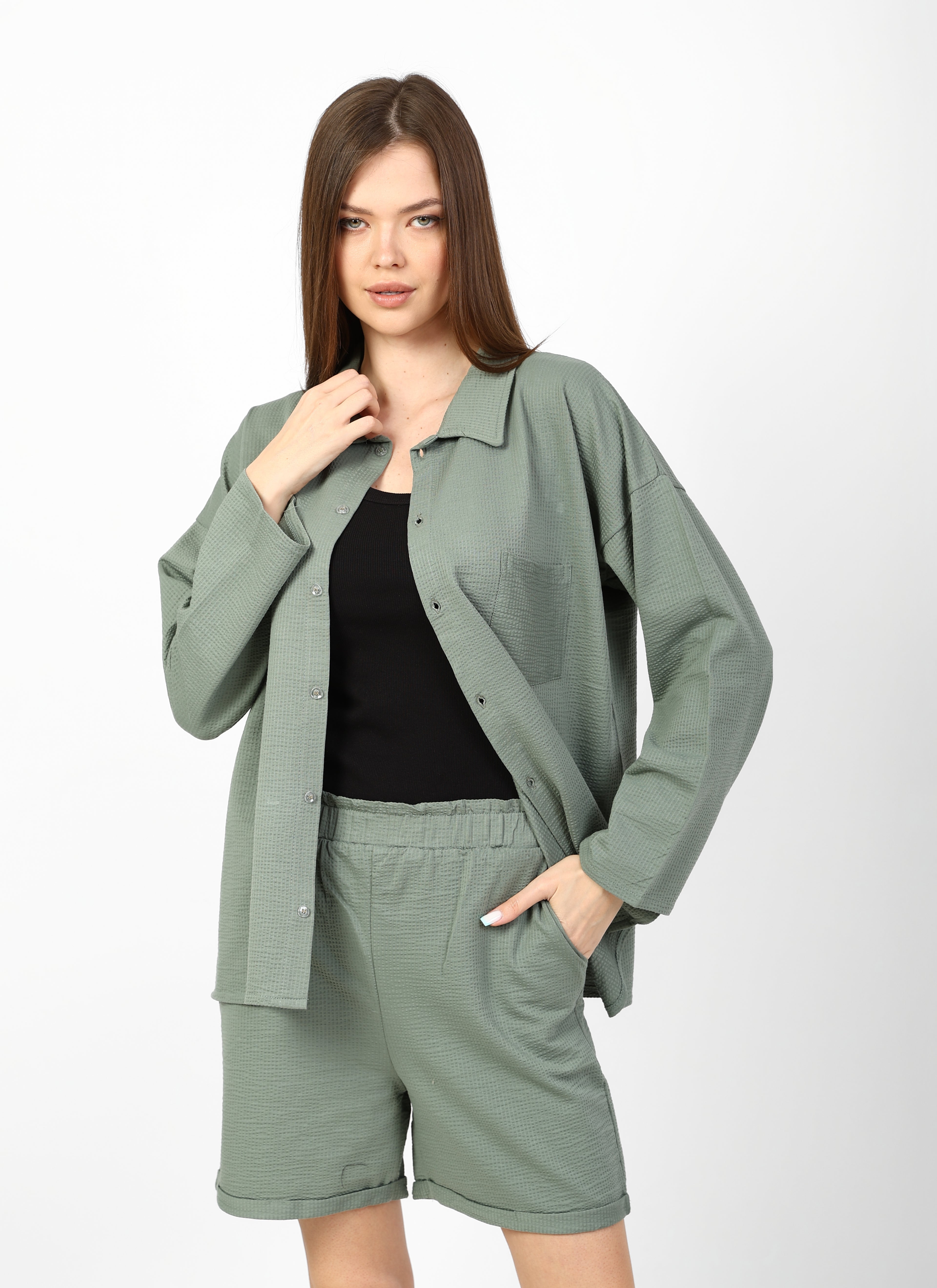 Modern 3-piece summer set (shirt, shorts, and top).