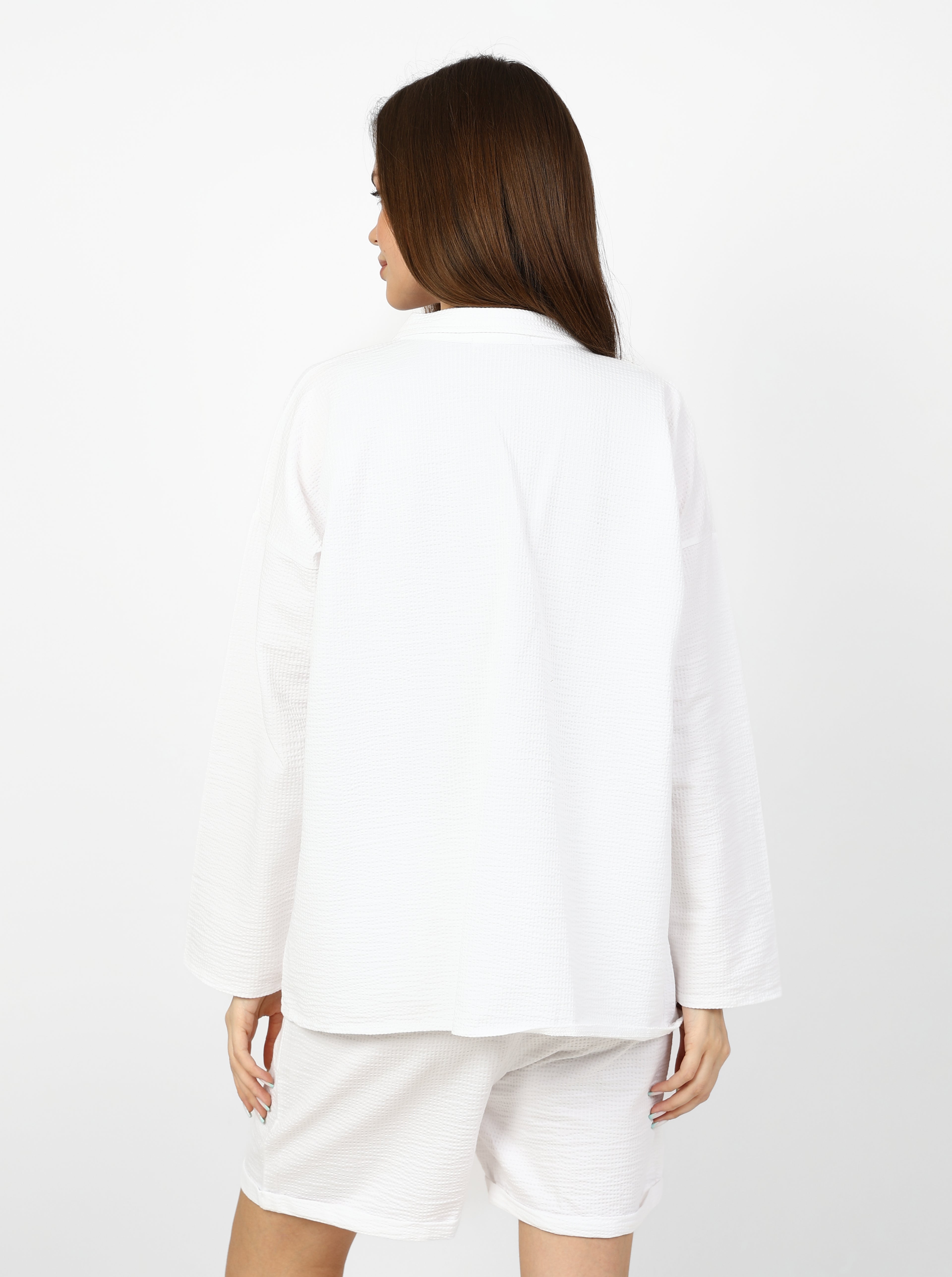 Modern 3-piece summer set (shirt, shorts, and top).
