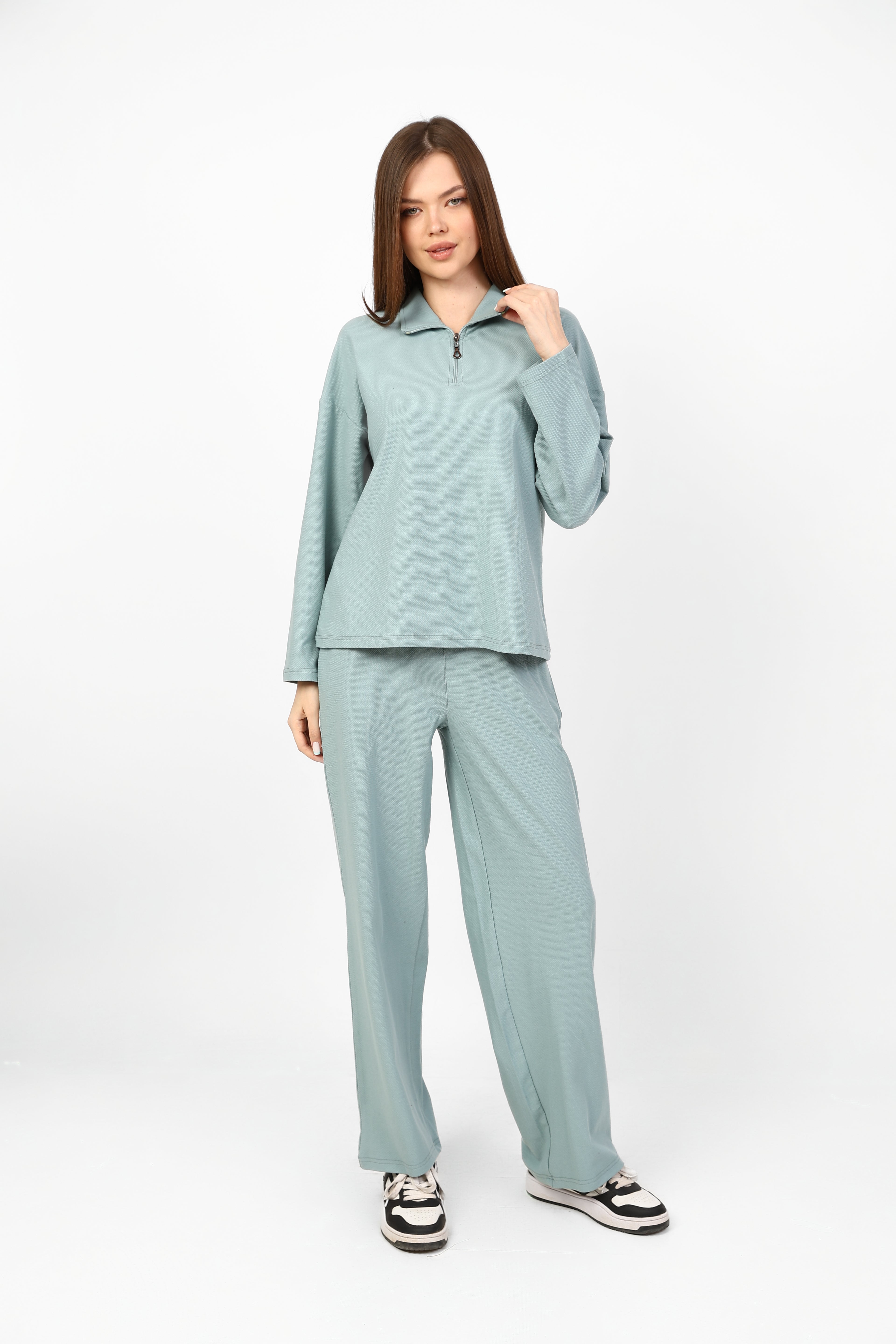 Casual matching set with an oversized top and straight-leg trousers.